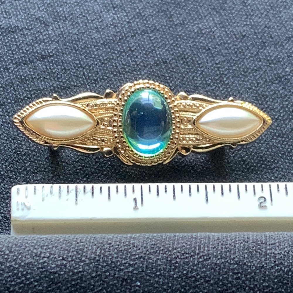Gold tone bar brooch